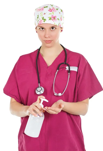 Médico femenino con jabón líquido —  Fotos de Stock
