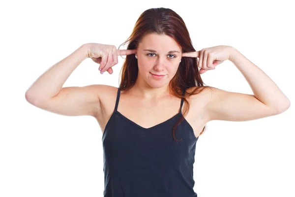 Mujer joven cerrando orejas con dedos —  Fotos de Stock