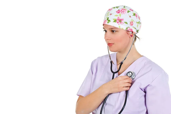 Kadın doktor kendini stetoskop ile incelenmesi — Stok fotoğraf