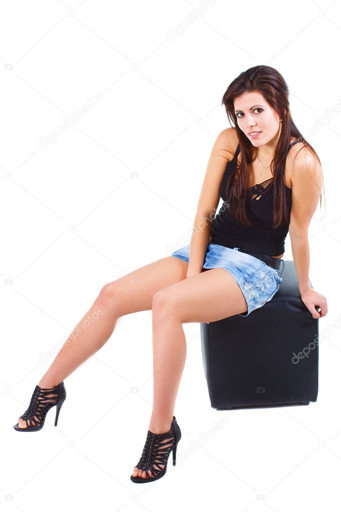 Beautiful young woman sitting on stool — Stock Photo © kataijuditfoto ...