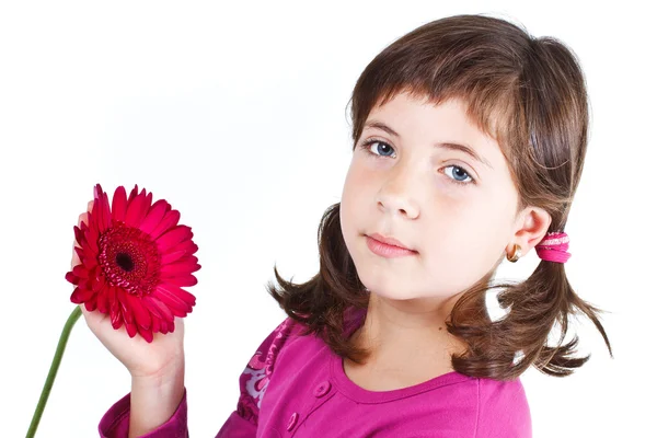 Leuk meisje met bloem — Stockfoto