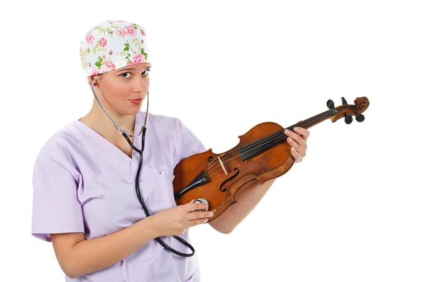 Kobieta lekarz na skrzypcach z stetoskop — Zdjęcie stockowe