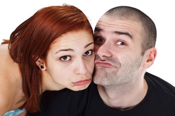 Young couple making grimace — Stock Photo, Image