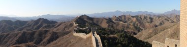 Panoramic photo of the Great Wall in China. clipart
