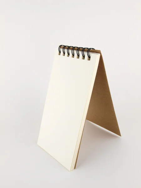 Caderno sobre o isolado branco — Fotografia de Stock
