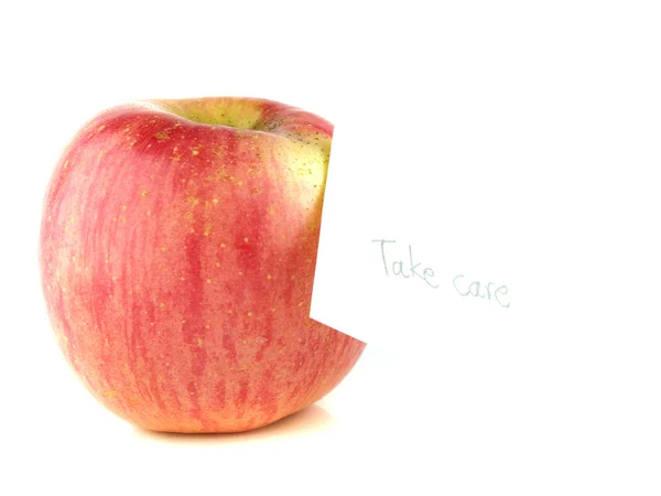 Jabłko z zastanego etykiety — Zdjęcie stockowe