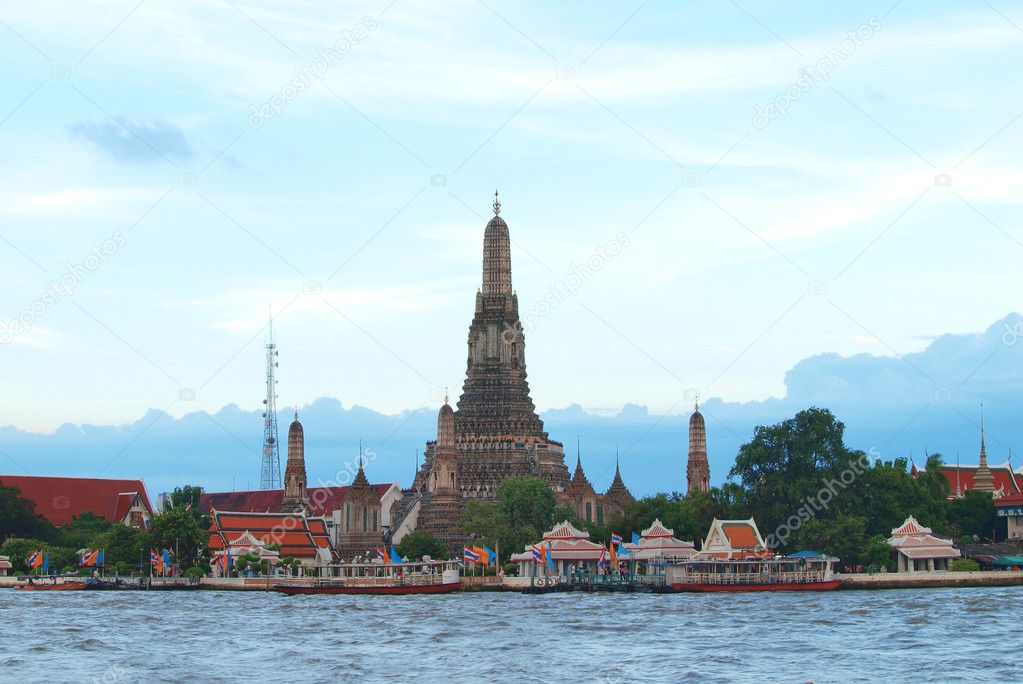Wat Arun temple in Bangkok on the shore of the Chao Phraya river