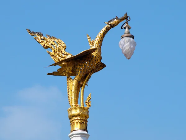 Golden swan lamp on electricity — Stock Photo, Image