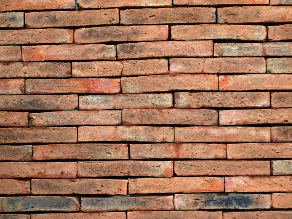 Oude rode grunge bakstenen muur — Stockfoto