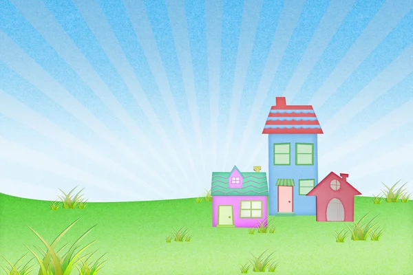 Haus aus Recyclingpapier mit Grasfeld und blauem Himmel — Stockfoto