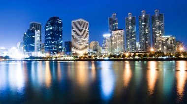 Bangkok city downtown at night with reflection of skyline, Bangk clipart