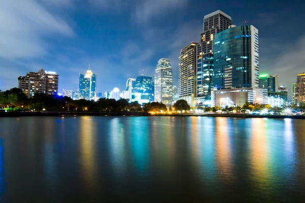 stock image Bangkok city downtown at night with reflection of skyline, Bangk