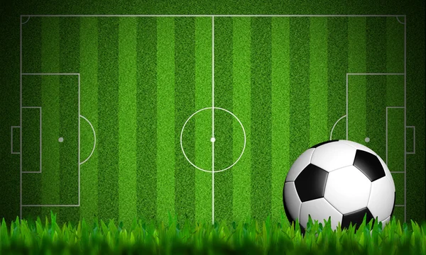 Футбол в зеленой траве на белом фоне — стоковое фото