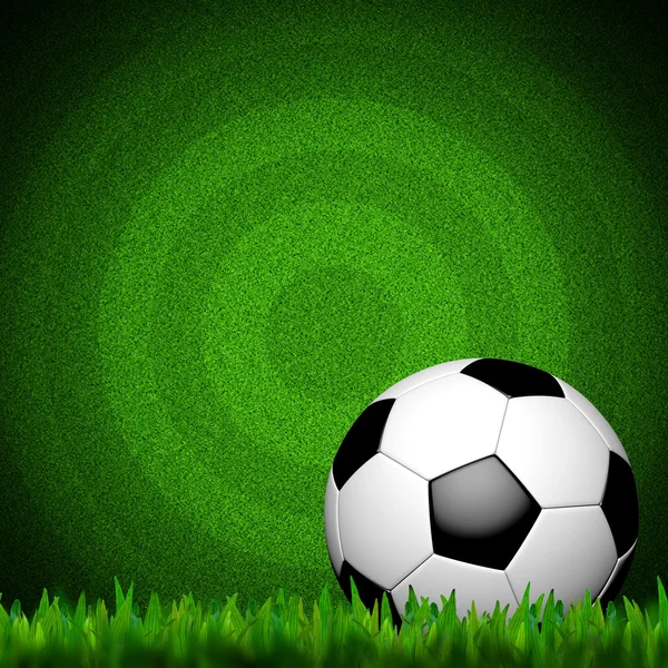 Футбол (футбольный мяч) в зеленой траве — стоковое фото