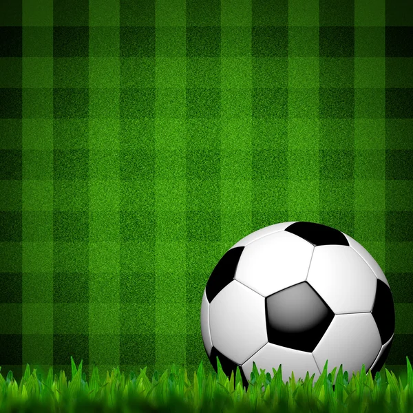 Футбол (футбольный мяч) в зеленой траве — стоковое фото
