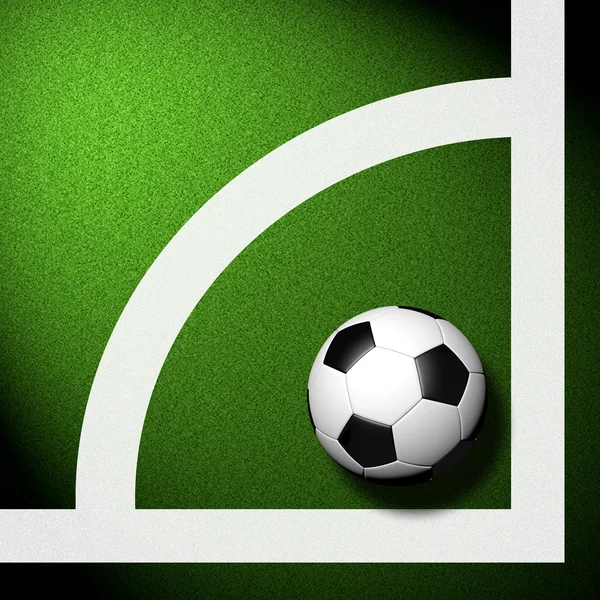 Футбол (футбольний м'яч) у зеленій траві — стокове фото
