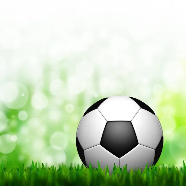 3D fotboll i grönt gräs och bakgrund — Stock fotografie