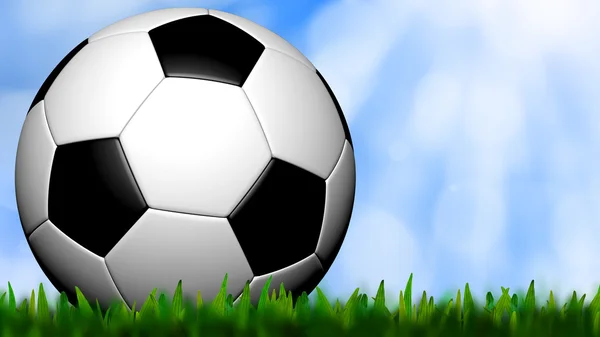 Voetbal in groene gras over een hemel — Stockfoto