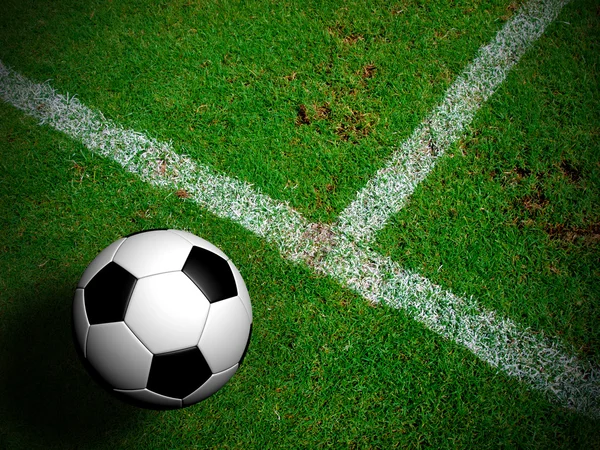Futebol (bola de futebol) no campo de grama verde . — Fotografia de Stock