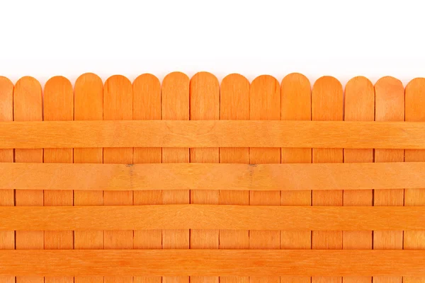 Oranje houten hek. — Stockfoto