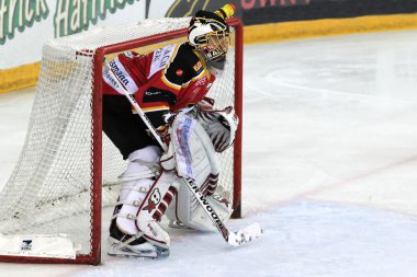 Goalie-hockey player is on the ice clipart