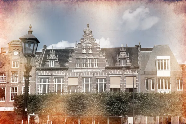 Vistas da antiga cidade holandesa de Delft feitas em estilo retro artístico — Fotografia de Stock