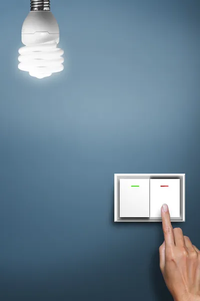 Hand pressed to light switch — Stock Photo, Image