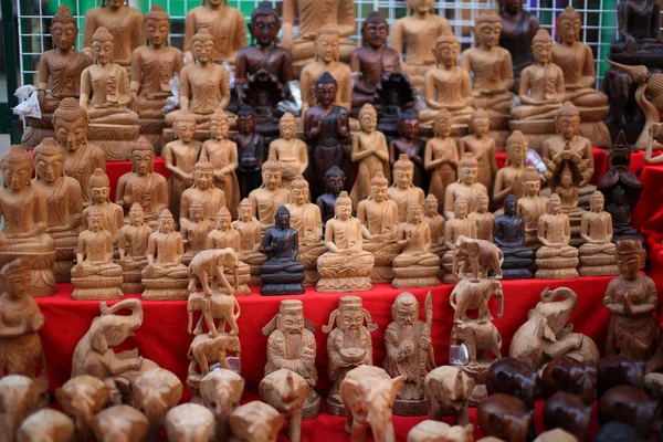 stock image Buddha statue stacks on table