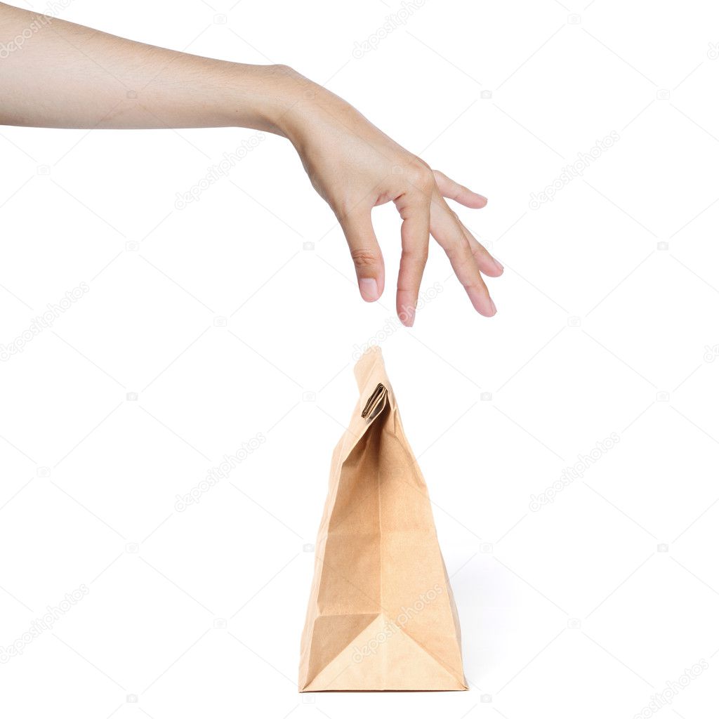 Hand picking paper bag.