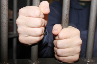 Man behind bars clipart