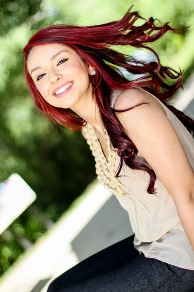 Young stylish woman smiling — Stock Photo, Image