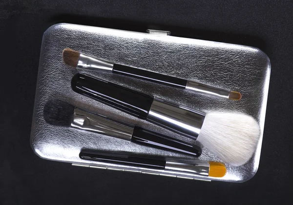 stock image Make-up brushes on dark background