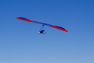Hang Gliding into the Blue clipart