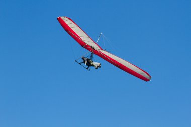 Hang Gliding on a Wing clipart
