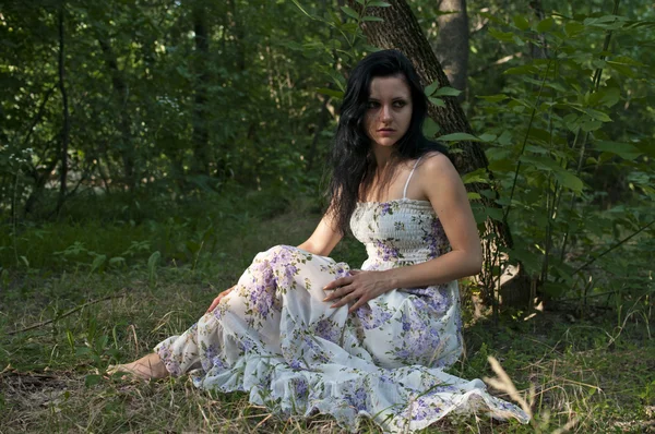 stock image A girl under the tree