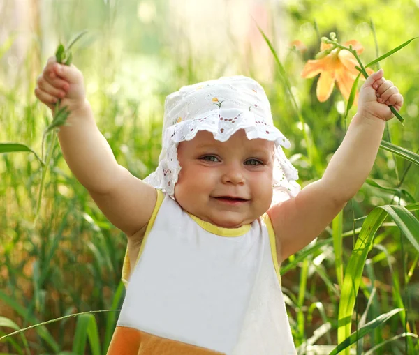 Happy smiling baby girl showing hands up — Stock Photo, Image