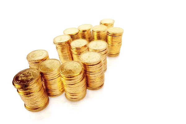 Sinal de dinheiro feito de moedas empilhadas — Fotografia de Stock