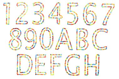 ABC ve sayılar üzerine beyaz izole şeker yapılan üst kapaklar.