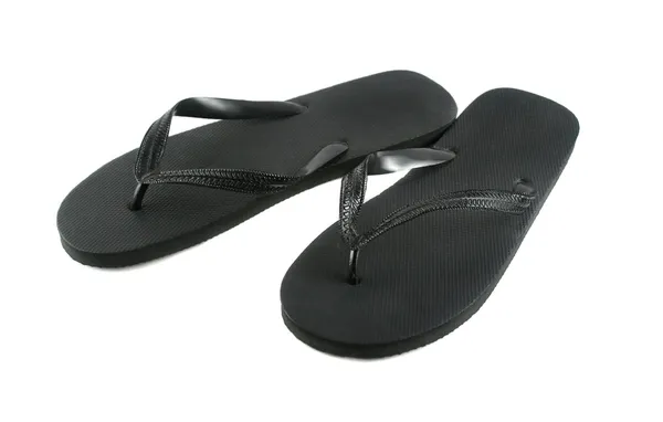 Zwarte flip-flops — Stockfoto