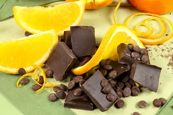 Chocolate Pieces And Orange — Stock Photo, Image