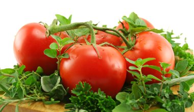 Tomatoes On A Bed Of Herbs clipart
