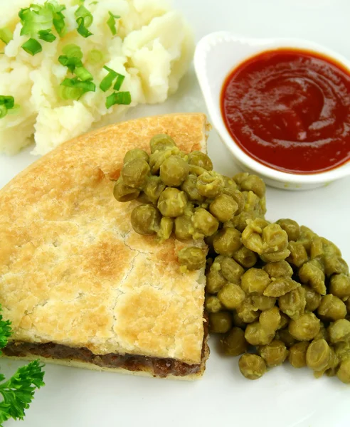Kødtærte med grødet ærter - Stock-foto