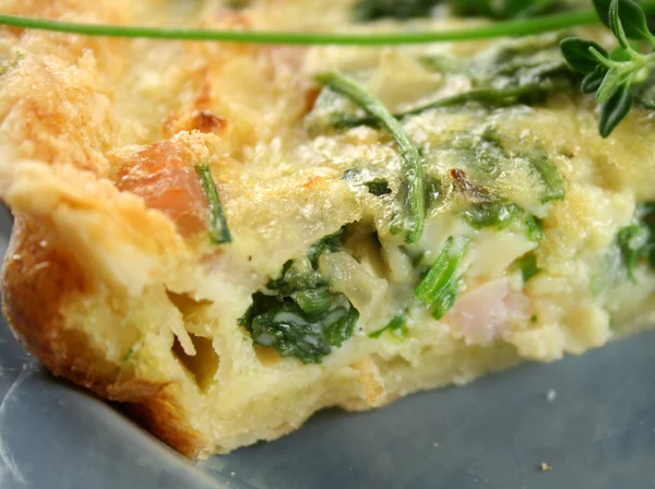 Slice Of Spinach And Bacon Quiche — Stock Photo, Image