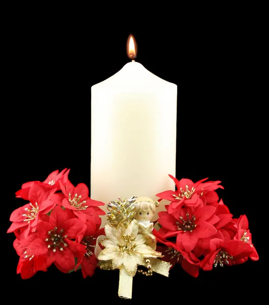 Vánoční svíčky červené květiny — Stock fotografie