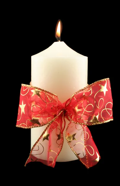 Vánoční svíčka s červenou stuhu — Stock fotografie