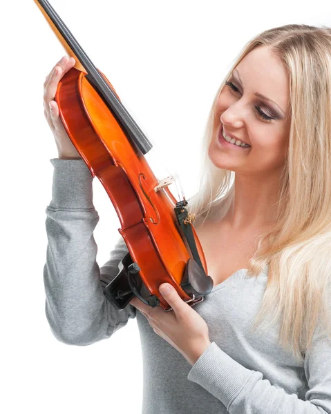 Jeune fille souriante tenant un violon — Photo