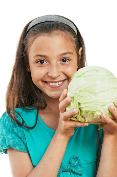 The girl is holding the cabbage — Stock Photo, Image
