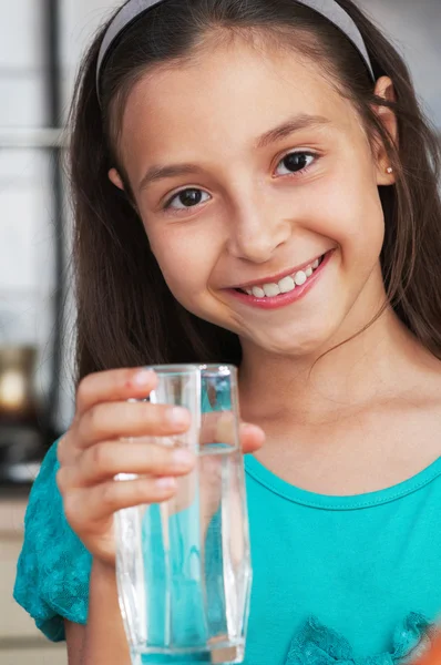 stock image Girl holding a glass of fresh water