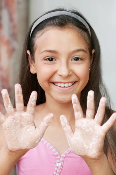 The girl is showing her hands — Stock Photo, Image