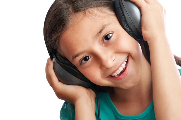 The girl is holding the headphones — Stock Photo, Image
